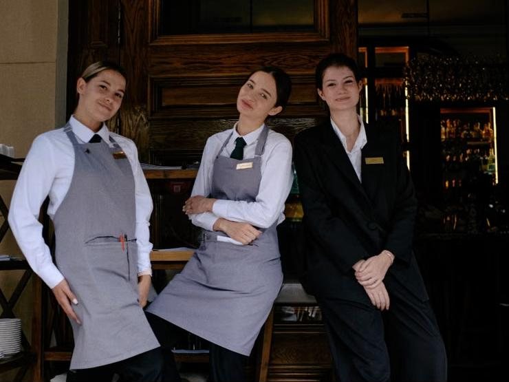 Illustrative photo: restaurant staff in uniform